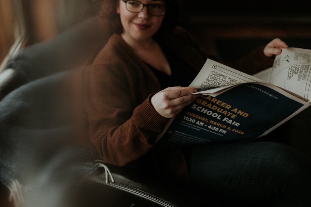 person reading newspaper