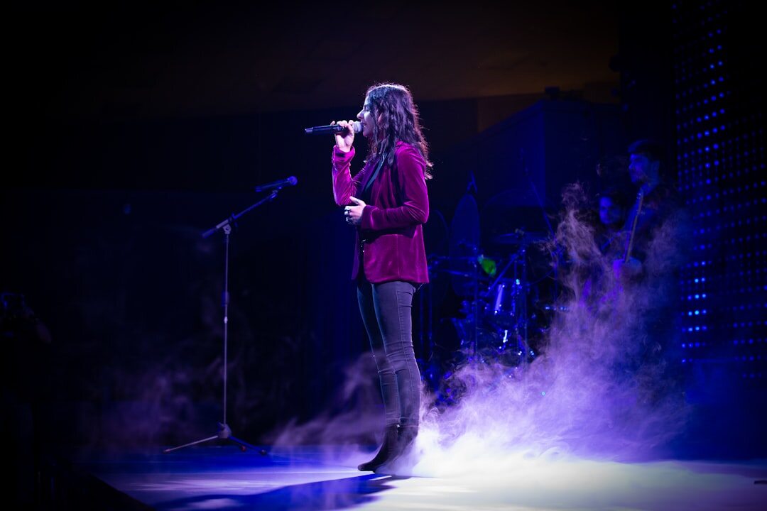 female singer on stage performing